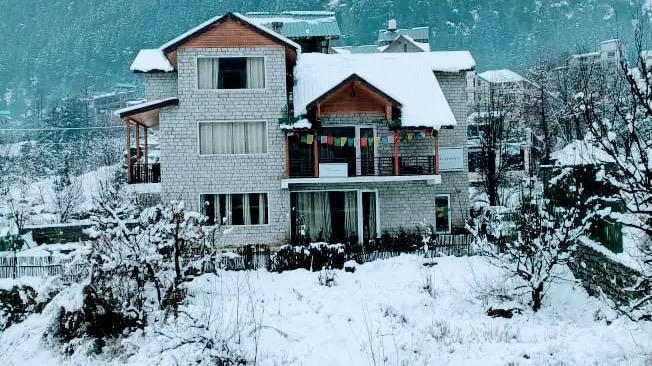 Skye Meadows front exterior in snow